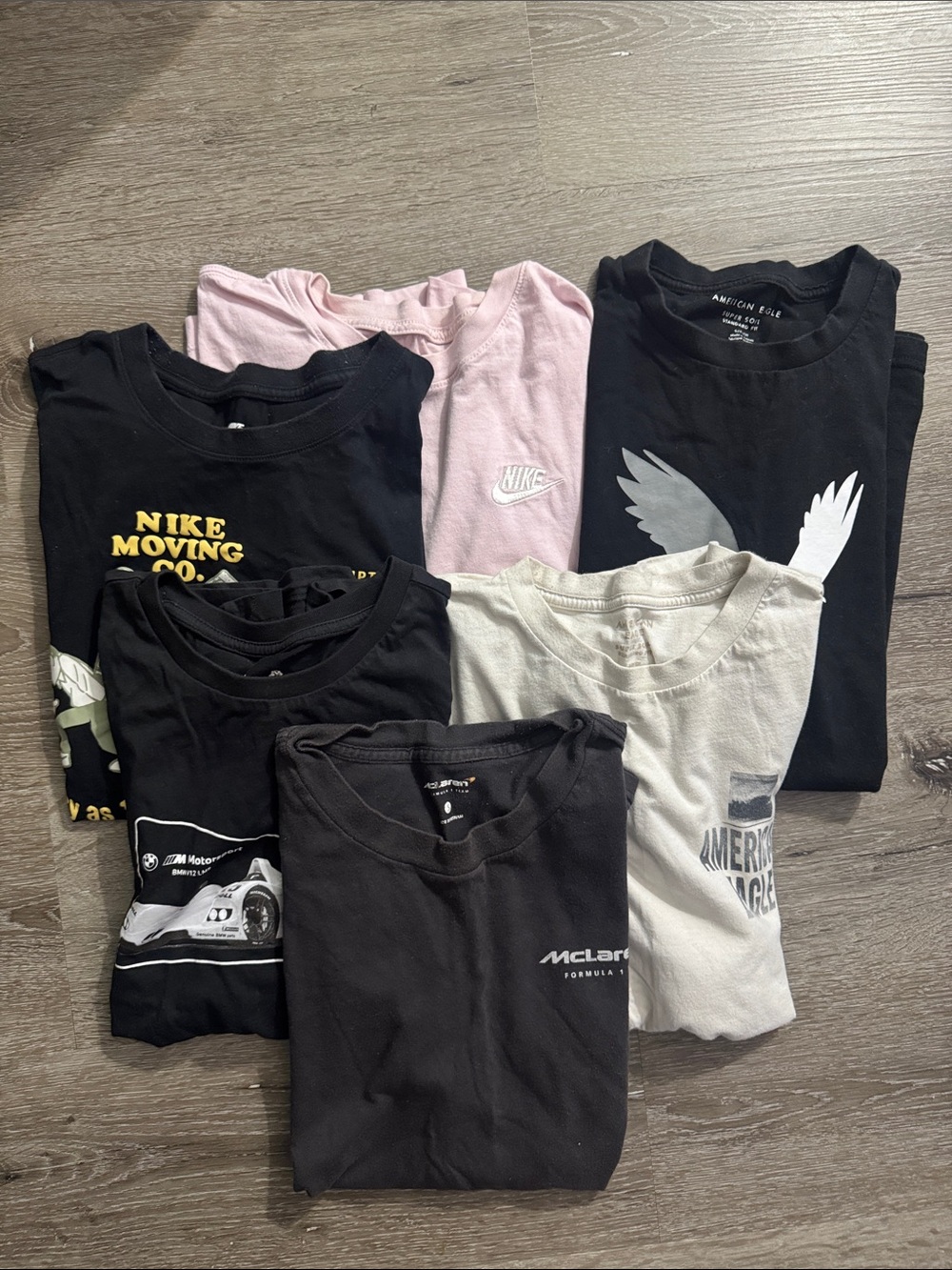 Six Hollister, American Eagle, Nike and Puma shirt sleeve shirts, size small.